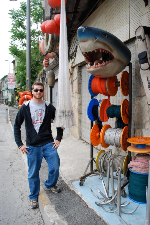 Special FSP guest Chris Young '05 poses with a dramatic fishing tackle display.